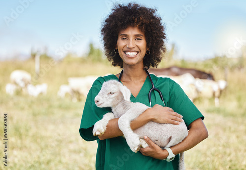 Farm, portrait and woman holding sheep on livestock field for medical animal checkup. Happy, smile and female vet doctor doing consultation on lamb in agro, sustainable and agriculture countryside. photo