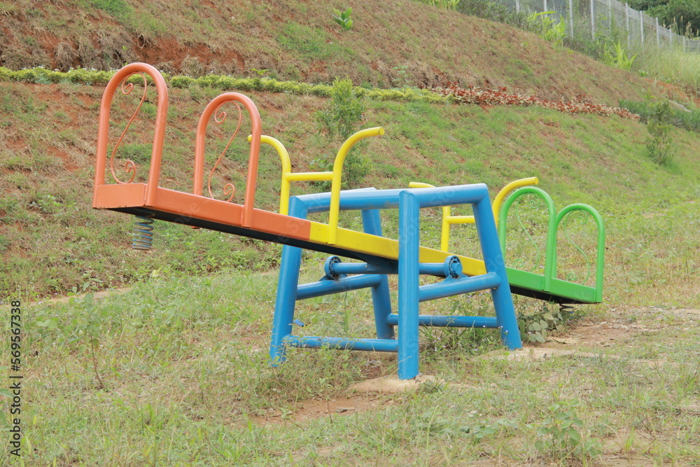 children's playground on the grass field in the park