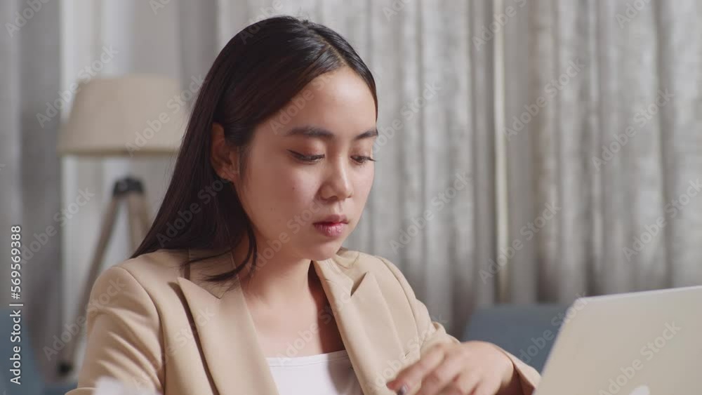 Close Up Of Sick Asian Businesswoman Having A Headache While Working With Laptop In The Living Room At Home
Close Up Of Sick Asian Businesswoman Having A Headache While Working With Laptop In The Living Room At Home