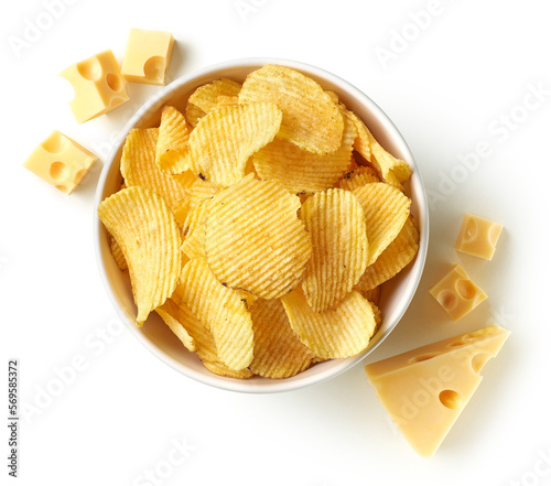 Bowl of crispy wavy potato chips or crisps with cheese photo