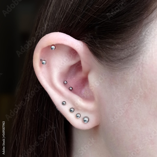 ear piercings photos.Helix piercing.Ear rings photo