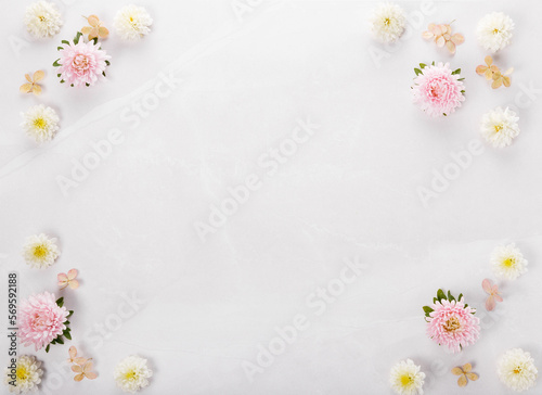 Spring frame of small flowers and daisy, floral arrangement
