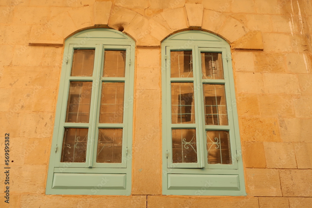 Turquoise, baby blue windows in As-Salt, Salt, Jordan