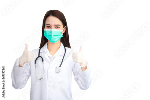 Asian professional woman doctor who wears medical coat and face mask shows thump up as “good” sign on a white background in health protection concept.
