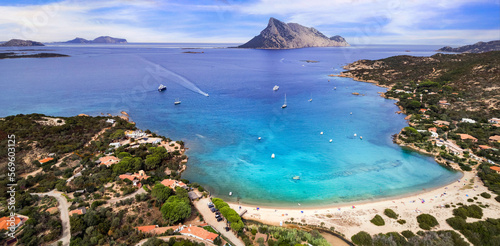 Sardegnia island nature scenery and best beaches. Aerial drone panoramic view of beautiful Tavolara island. Italy summer holidays photo