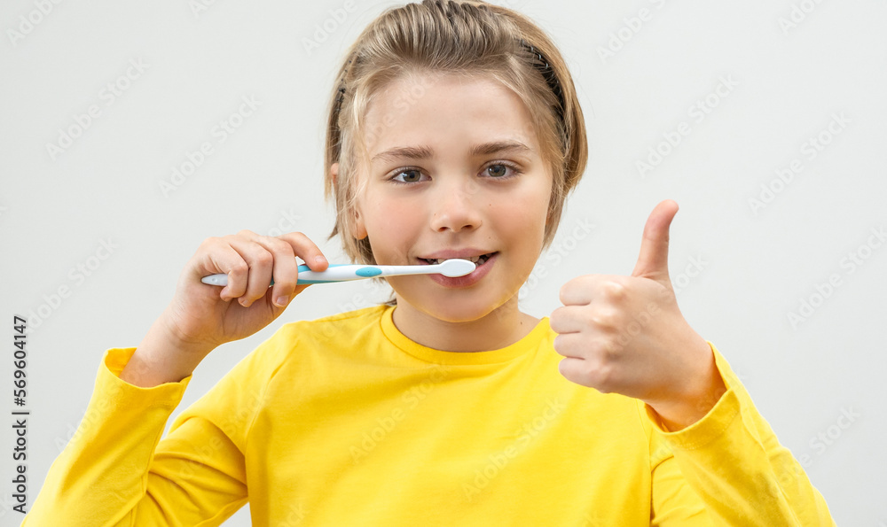 Teenager Boy Brush Teeth Child Looking At Camera Over White Background , Dentistry, Stomatology, Dental Care Hygiene With Toothbrush Toothpaste, Morning Evening Routine, Lifestyle, Health Care. Teenager Boy Brush Teeth Child Looking At Camera Over White Background , Dentistry, Stomatology, Dental Care Hygiene With Toothbrush Toothpaste, Morning Evening Routine, Lifestyle, Health Care.