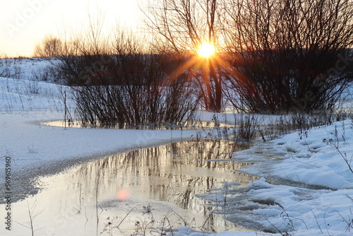 Sunset over winter flood