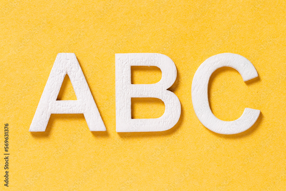 ABC letters of the alphabet, isolated on yellow background ABC letters of the alphabet, isolated on yellow background