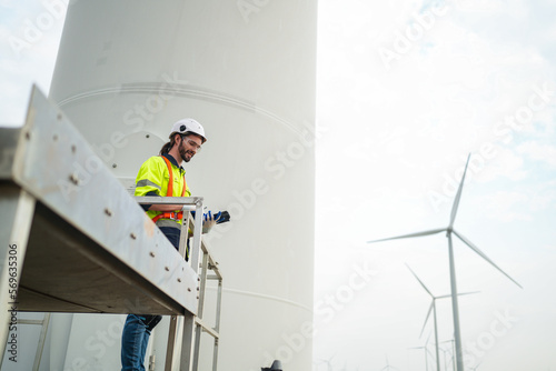 Wallpaper Mural Wind turbine technicians working at the site work, low angle view on two engineers. Torontodigital.ca