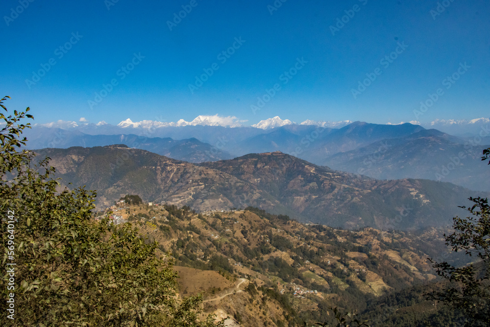 Tiny Village of Bhotechaur with HImalayas in the Background