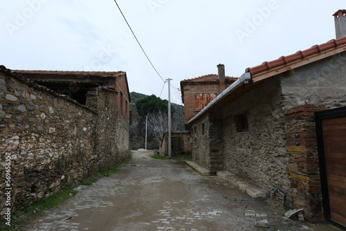 izmir, bayındır, yusuflu, Turkey 02.06.2023 
A view from the historic village with stone-walled houses with wooden windows and doors photo