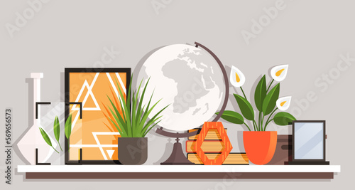 Wooden shelf with decor items. Cartoon design style bookshelf with different interior things potted plant, books, globe and pictures in frame. Hanging shelf with decorations. Office or home furniture
