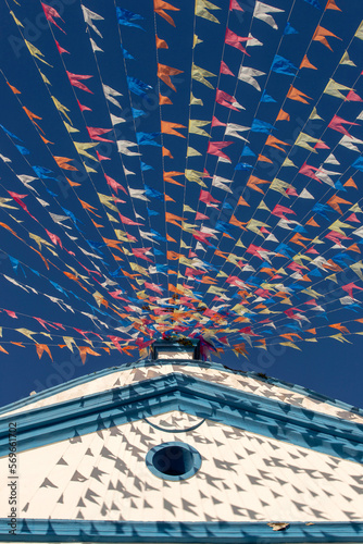 Church of Our Lady of Help, or Nossa Senhora d Ajuda in portuguese, decorated with June festival flags. Ilhabela, colonial town on the coast of Sao Paulo state, Brazil	
 photo