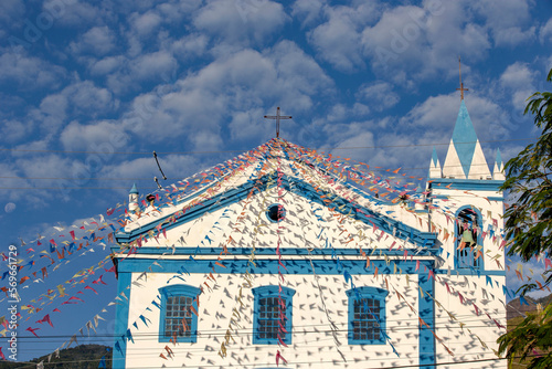 Church of Our Lady of Help, or Nossa Senhora d Ajuda in portuguese, decorated with June festival flags. Ilhabela, colonial town on the coast of Sao Paulo state, Brazil	
 photo