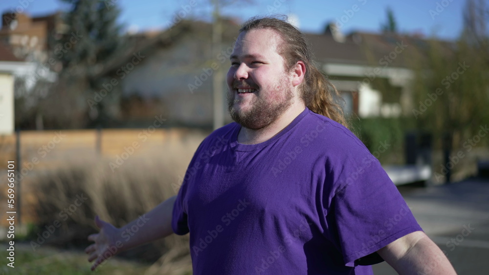 Young man with beard wearing casual clothes feeling very happy and excited doing winner gesture with arms raised. Person smiling and screaming for success. Celebration Young man with beard wearing casual clothes feeling very happy and excited doing winner gesture with arms raised. Person smiling and screaming for success. Celebration
