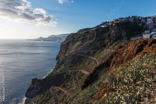 Beautiful mountain with a serpentine road near the ocean in Madeira island