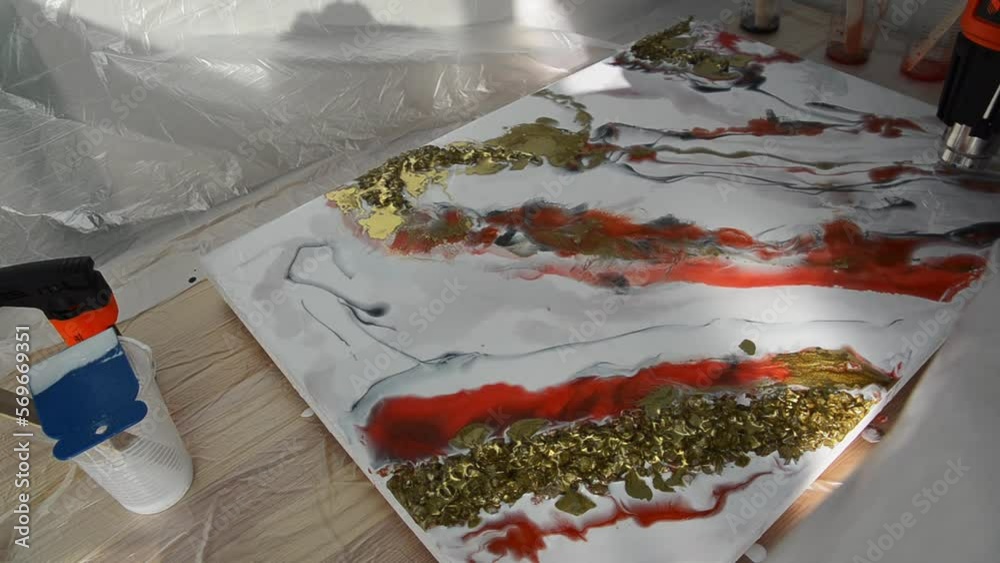 Epoxy resin art, imitation marble. Modern trendy hobby. The pouring