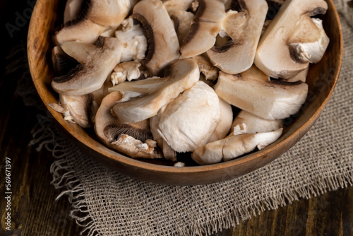 Peeled, washed and cut mushrooms champignons during cooking