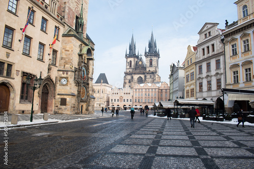 Spring morning on the Old Town square with Tyn Church. Sunny cityscape in capital of Czech Republic - Prague, Europe.
