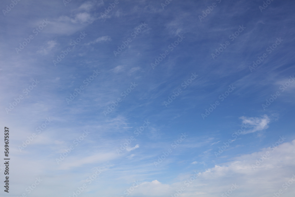 Fluffy white clouds in a blue sky 