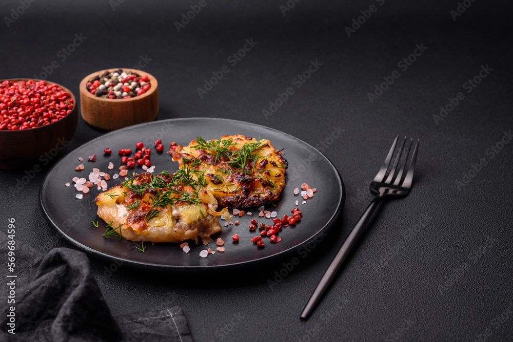 Meat baked in the oven with pineapple, tomatoes, cheese, spices and herbs Meat baked in the oven with pineapple, tomatoes, cheese, spices and herbs