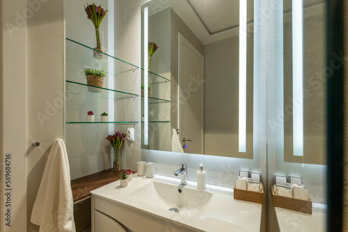 Interior of a modern bathroom with shower cabin