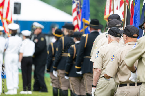 American Legion veterans assembling at outdoor event