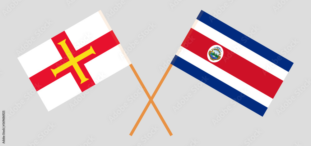 Crossed flags of Bailiwick of Guernsey and Costa Rica. Official colors. Correct proportion