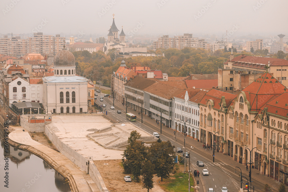 Highlight the Art Nouveau-style hotels of Oradea, with their luxurious amenities, elegant rooms, and stunning architecture. Showcase the beautiful Art Nouveau homes of Oradea