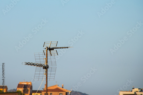 TV Antenna on Blue sky background © Photo ArtStudio29