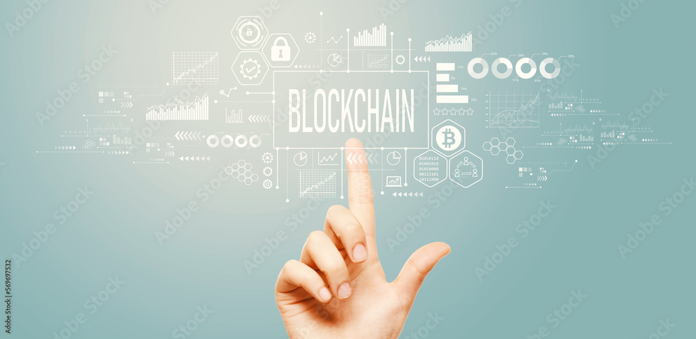 Blockchain theme with hand pressing a button on a technology screen Blockchain theme with hand pressing a button on a technology screen