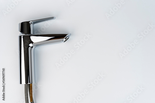 new shiny sink faucet on a white background. Sink mixer