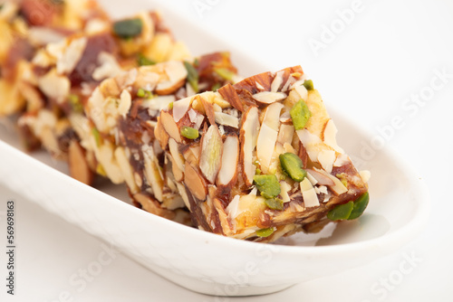 Khajur Barfi Or Khajoor Dry Fruits Burfi Made Of Dates, Anjeer, Kaju, Cashew Nuts, Raisins, Kismis, Pista, Poppy Seeds, Almonds, Pistachio, Badam, Mawa Are Rich In Dietary Fiber, Proteins And Vitamins