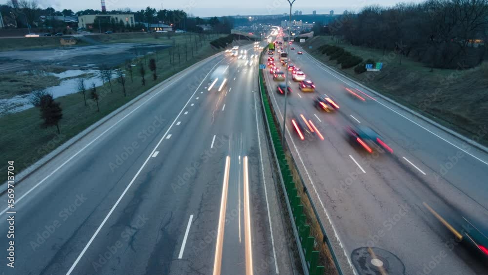 Evening traffic on the bypass road, tilt time-lapse Evening traffic on the bypass road, tilt time-lapse