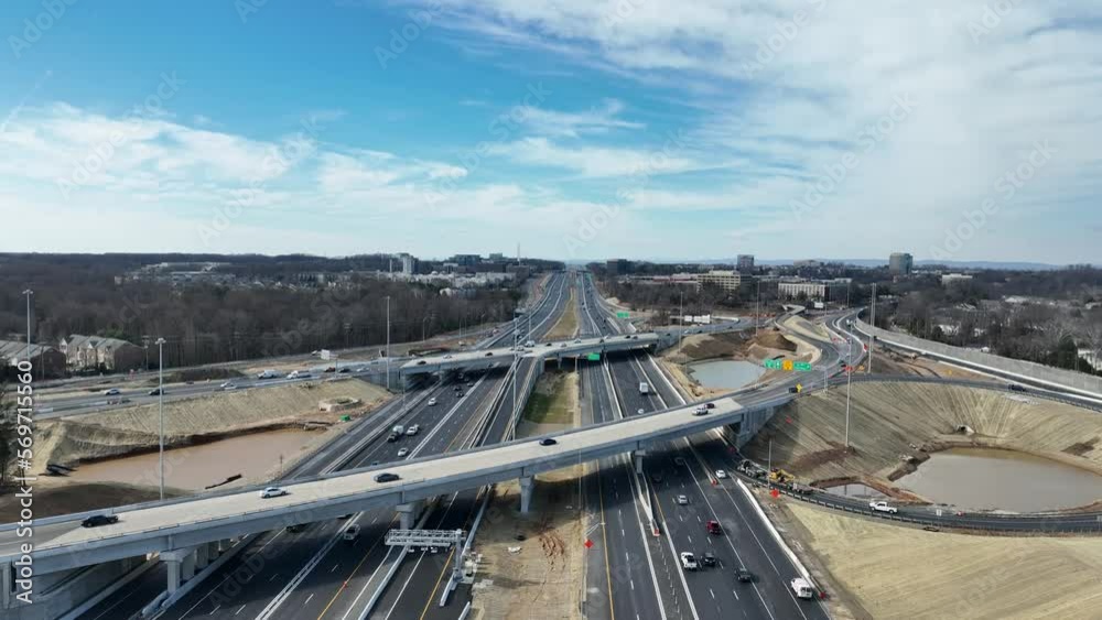 Aerial view of highway traffic passing, Virginia USA on sunny autumn day, drone shot Aerial view of highway traffic passing, Virginia USA on sunny autumn day, drone shot