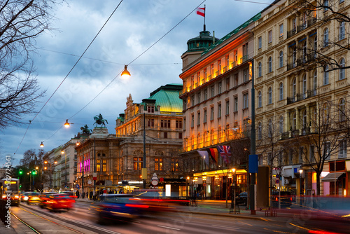 Photography View of Opernring and Vienna State Opera building in evening