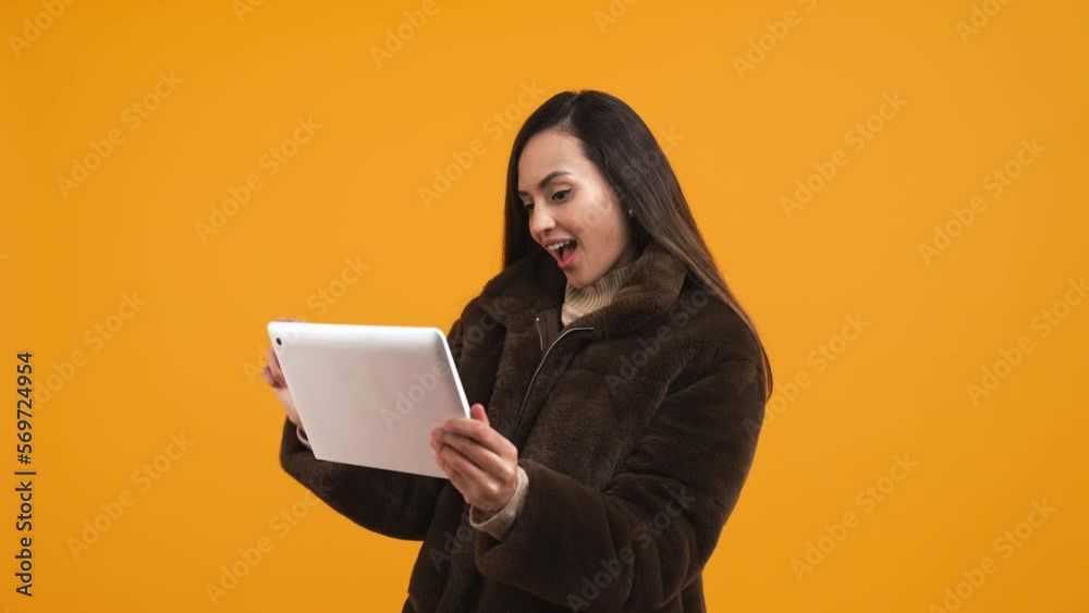 A cheerful woman taking a selfie using her digital tablet advanced technology concept. High-quality 4k footage A cheerful woman taking a selfie using her digital tablet advanced technology concept. High-quality 4k footage