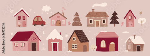 Cute Christmas houses. Winter village. Decorated Houses town.