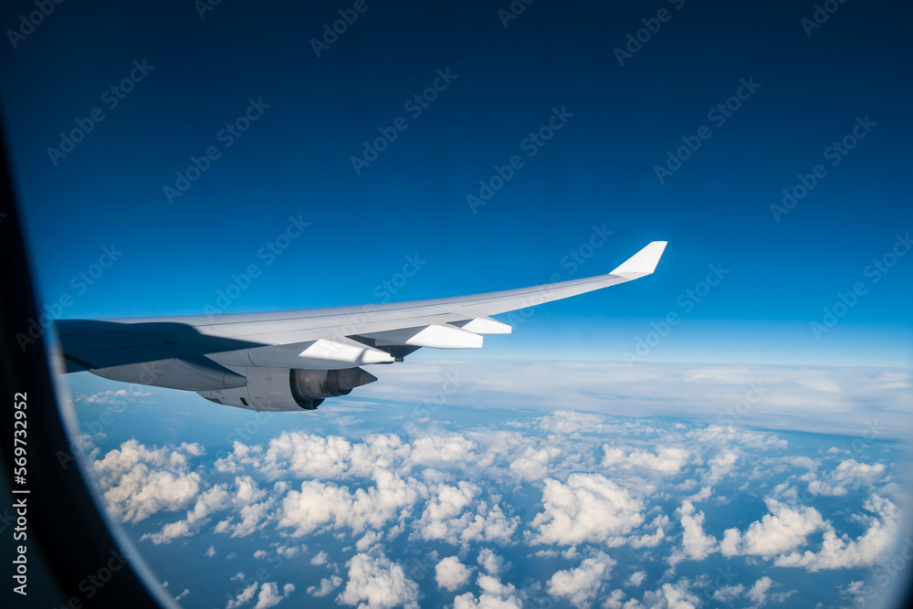 flying and traveling. Airplane interior or jet window with clouds and sky. Sky view from a high angle on the plane. flying and traveling. Airplane interior or jet window with clouds and sky. Sky view from a high angle on the plane.