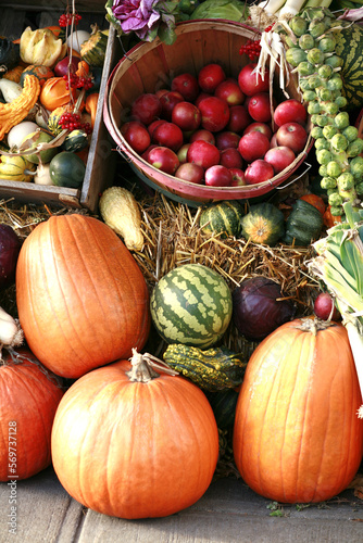 Pumpkins with vegetables and fruit at farmer s market.