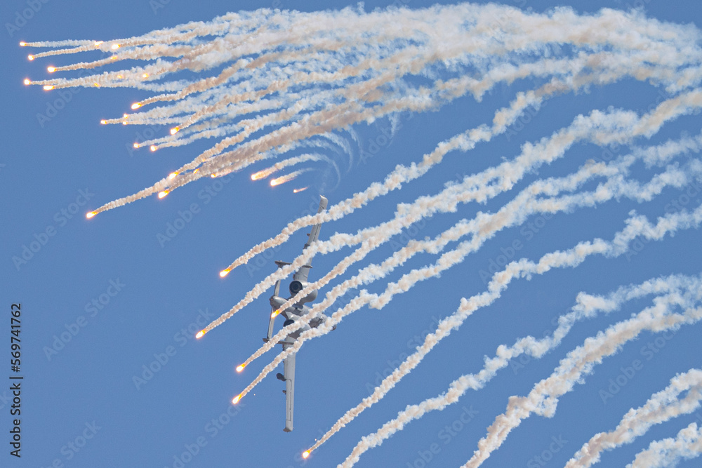 Very unusual view of a A-10 Thunderbolt II flying behind its flares Very unusual view of a A-10 Thunderbolt II flying behind its flares