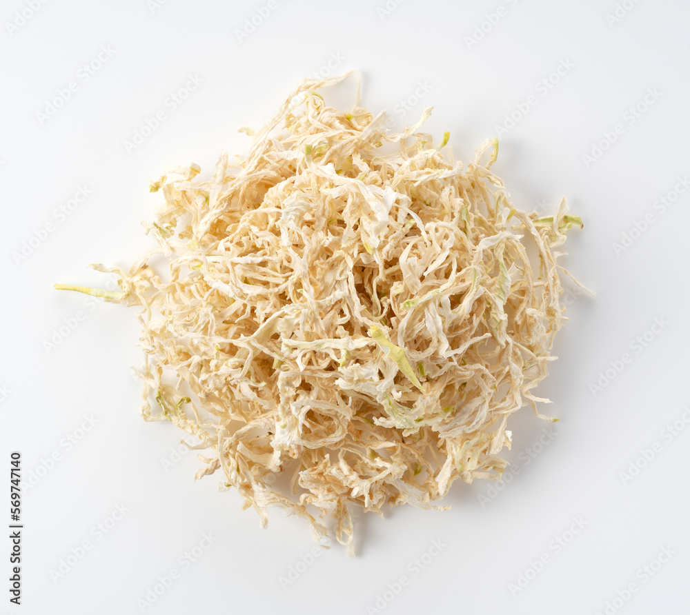 Kiriboshi-daikon (dried daikon radish) placed against a white background. Kiriboshi-daikon (dried daikon radish) placed against a white background.