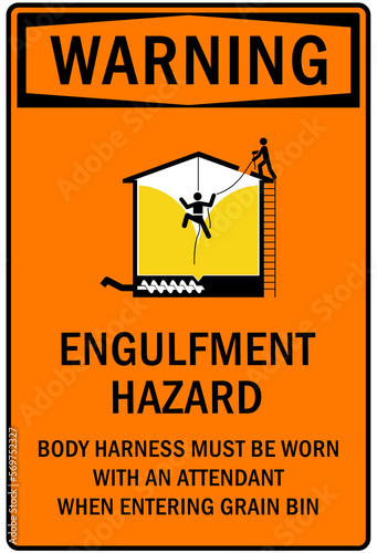 Safety equipment sign and labels engulfment hazard, body harness must be worn with an attendant when entering grain bin