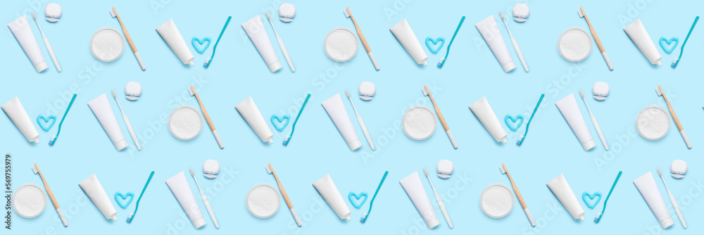 Many toothbrushes with paste, powder and dental floss on blue background. Pattern for design Many toothbrushes with paste, powder and dental floss on blue background. Pattern for design