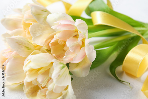Fototapeta Naklejka Na Ścianę i Meble -  Bouquet of beautiful tulip flowers on light background, closeup