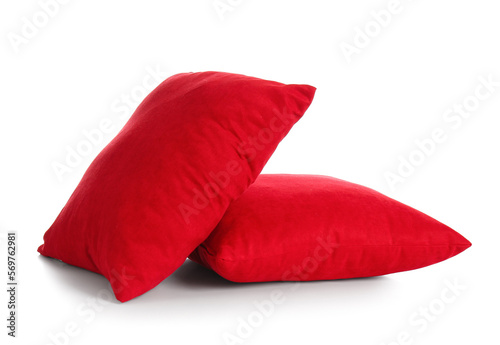 Red decorative pillows on white background