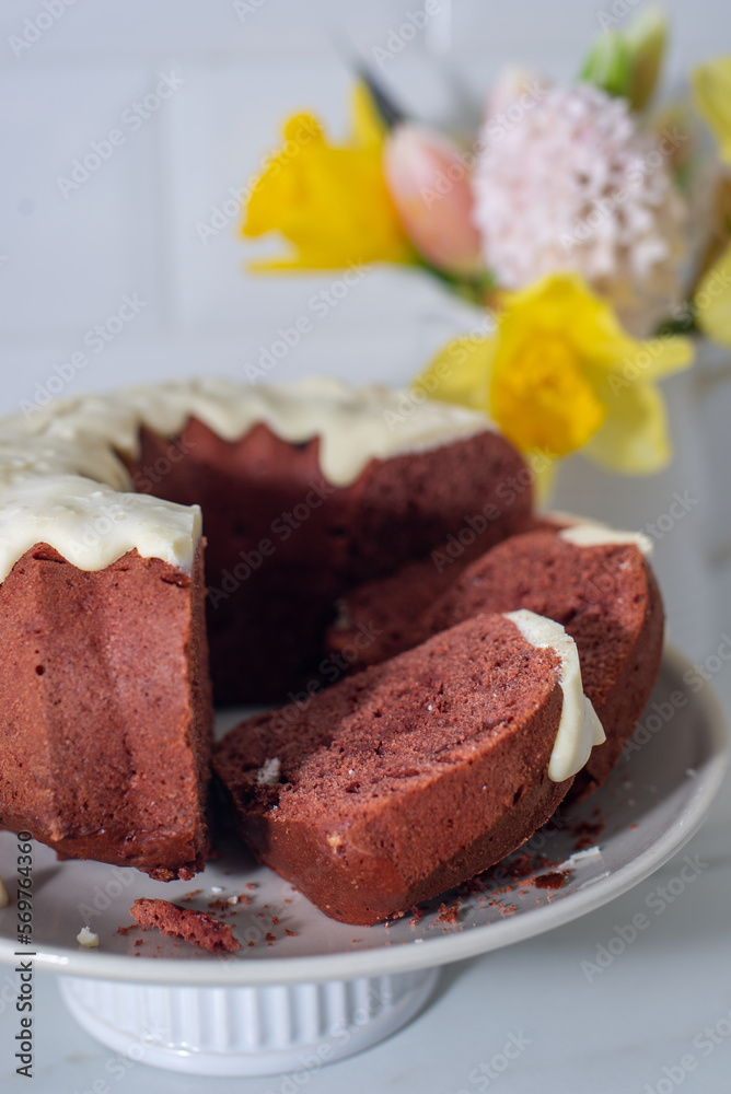 Freshly baked red velvet bundt cake on a table Freshly baked red velvet bundt cake on a table