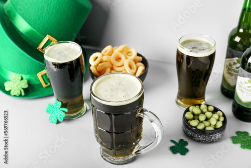 Glasses of beer, paper clov...