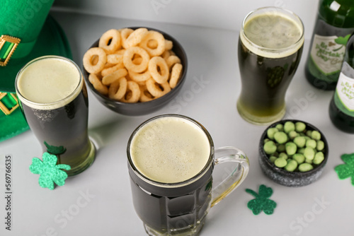 Glasses of beer, paper clov...
