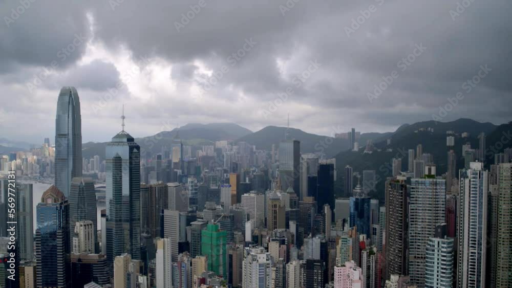 Drone aerial shot of modern skyscrapers in Hong Kong City. Hong Kong is a popular tourist travel destination in Asia. China. Storm clouds. DJI Inspire 2 X7 Drone aerial shot of modern skyscrapers in Hong Kong City. Hong Kong is a popular tourist travel destination in Asia. China. Storm clouds. DJI Inspire 2 X7